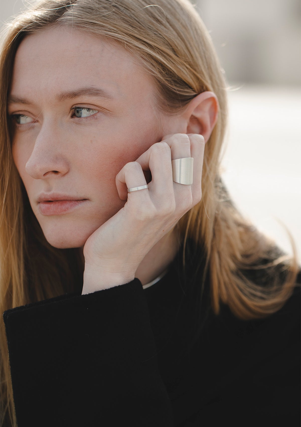 Sculptural wide silver statement ring, minimalist matte ring styled for everyday wear, Berlin jewelry designer