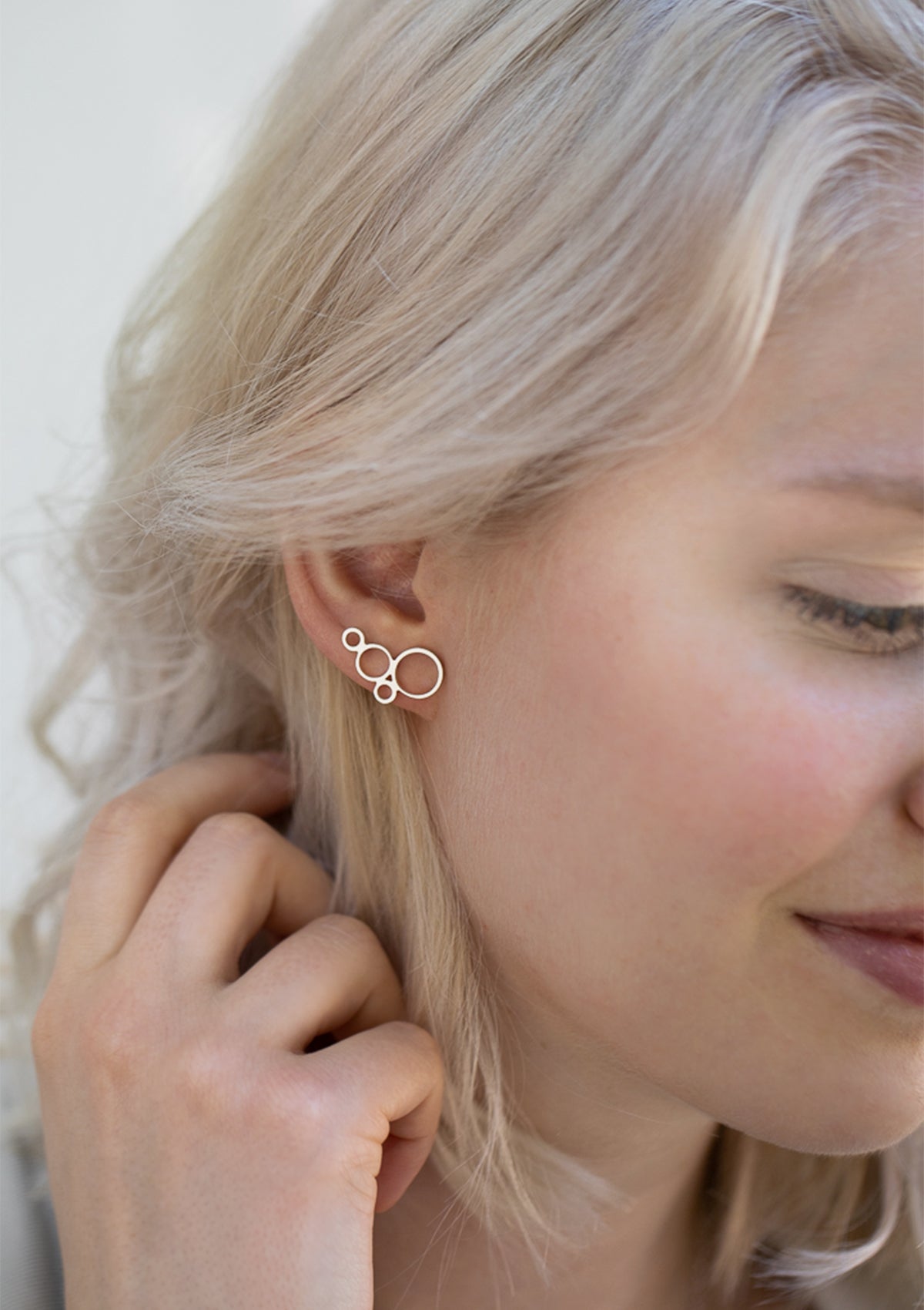 Minimalist sterling silver open circle earrings, climbing up the ear, contemporary handcrafted design