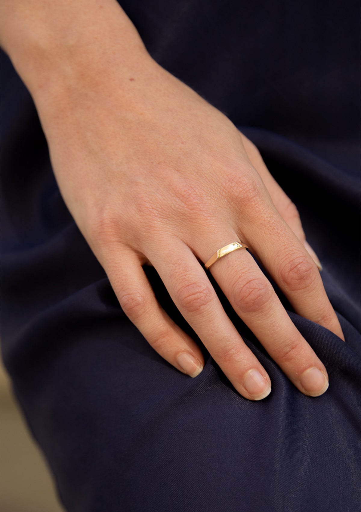 Geometric wedding ring with sculpted facets, classic and contemporary 14K gold design for daily wear