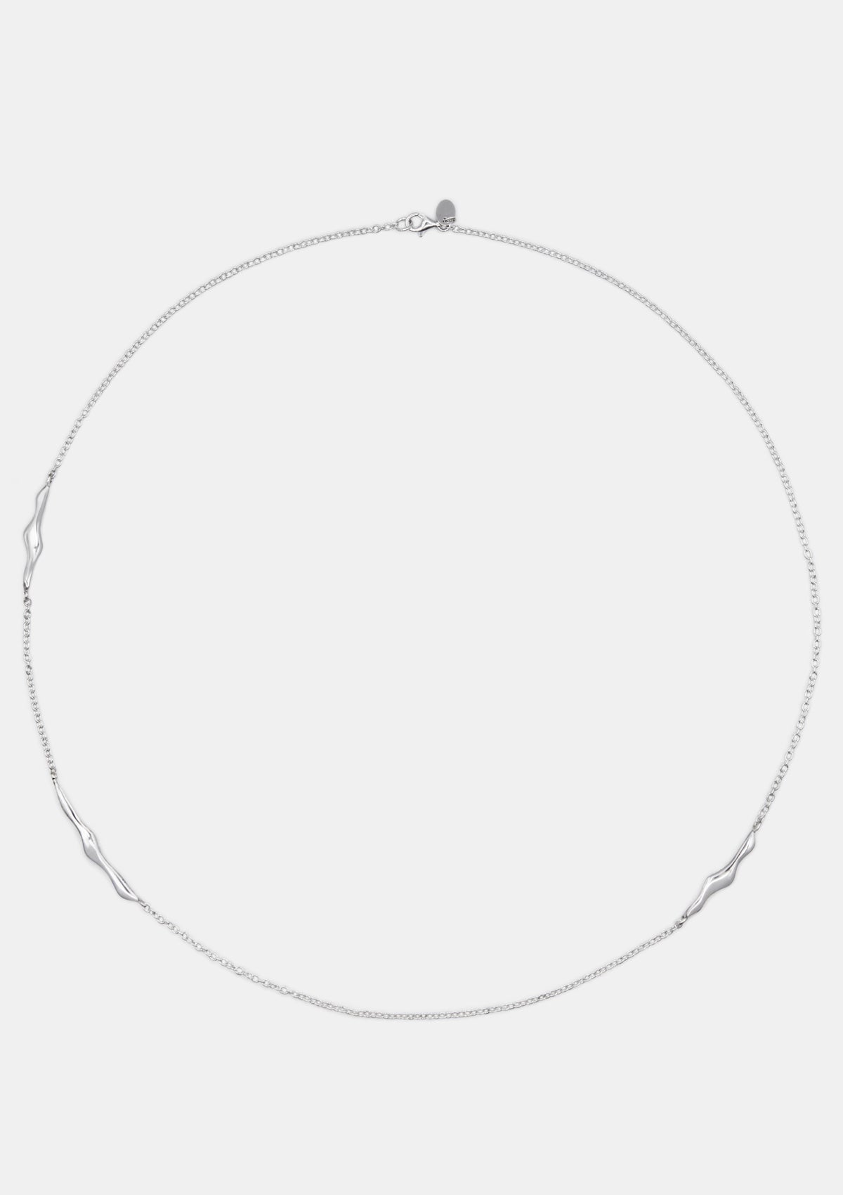 Unusual round chain necklace with asymmetrical silver drops, modern minimalist jewelry photographed flat