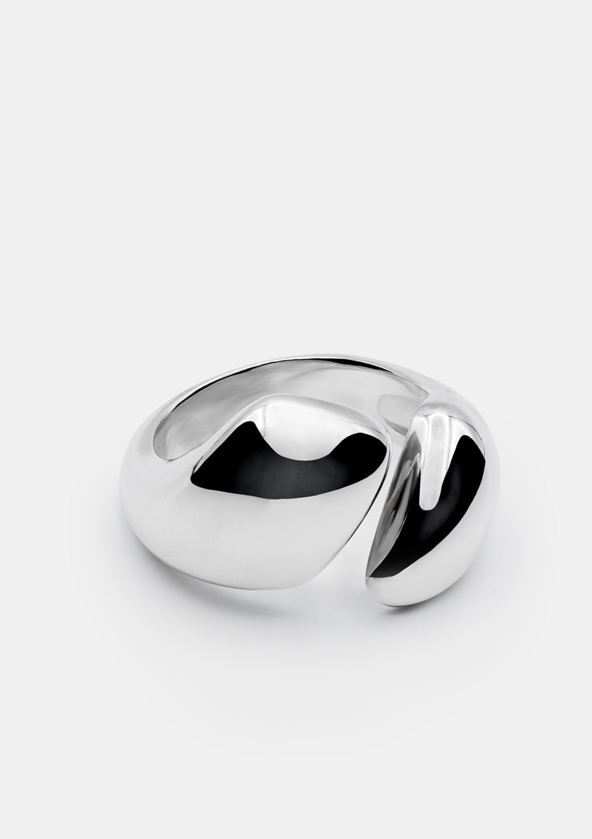 Sterling silver ring with sculptural open front and fluid shape, solid handmade jewelry piece