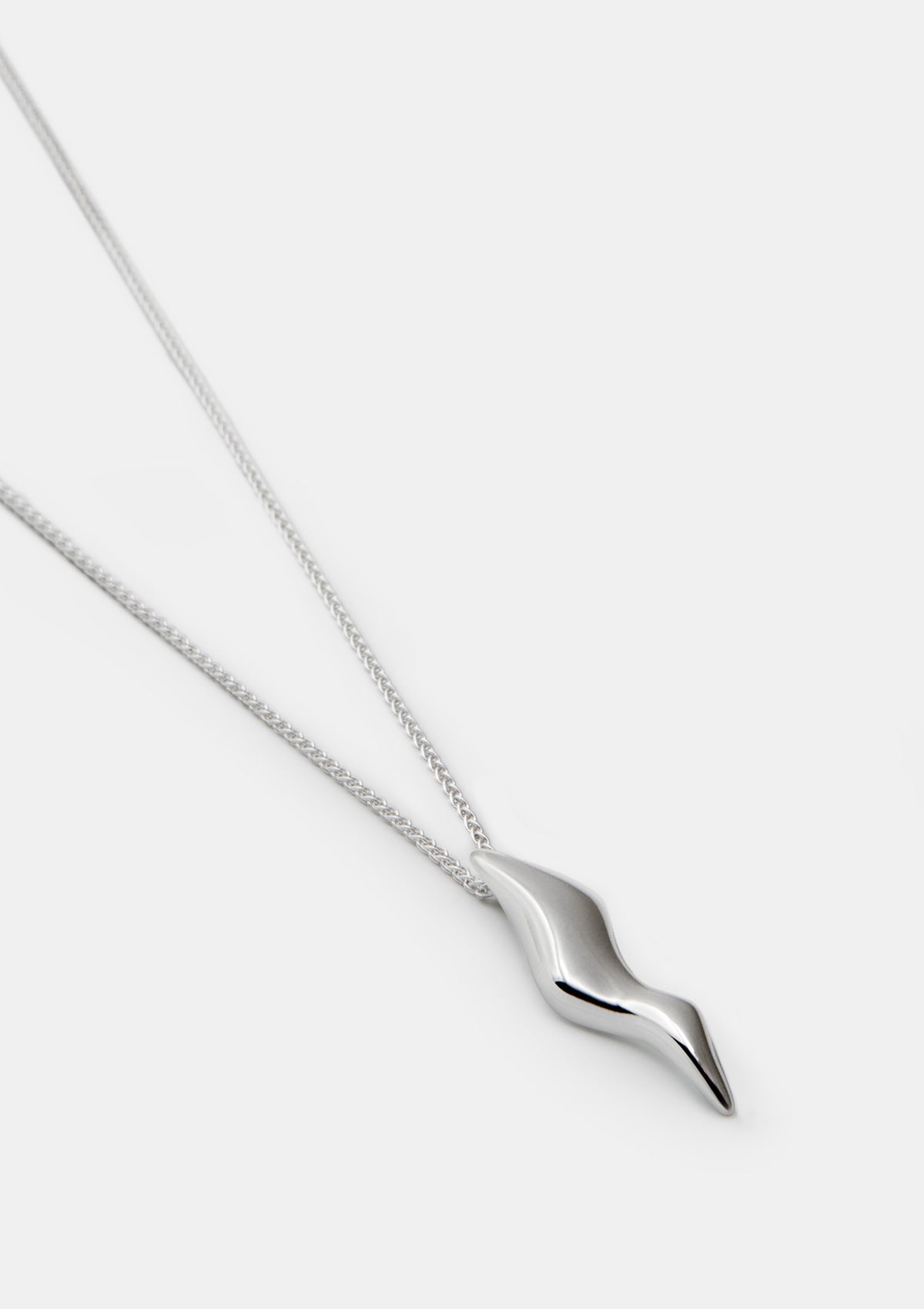 Sterling silver necklace with long chain and large sculptural pendant, floating wave design