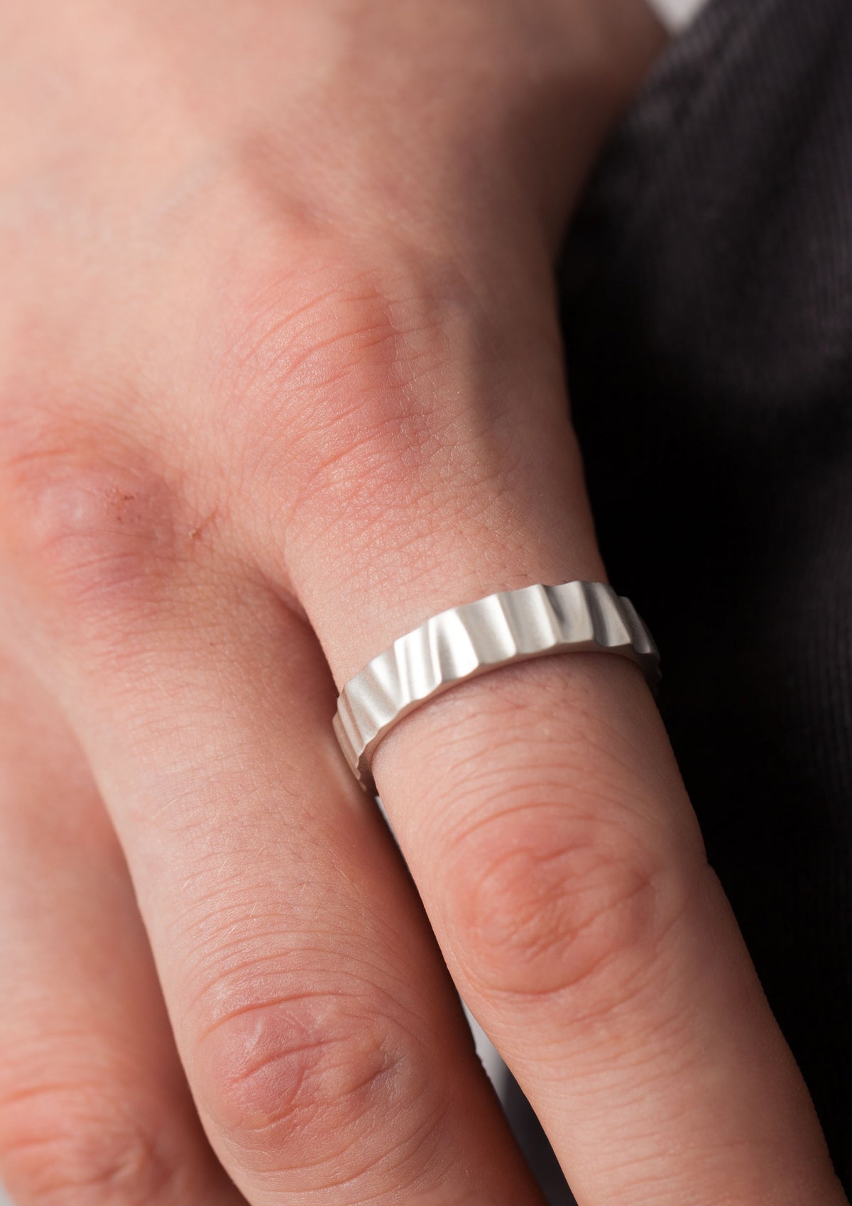 Wave ring by Sofia Kov, worn on the hand