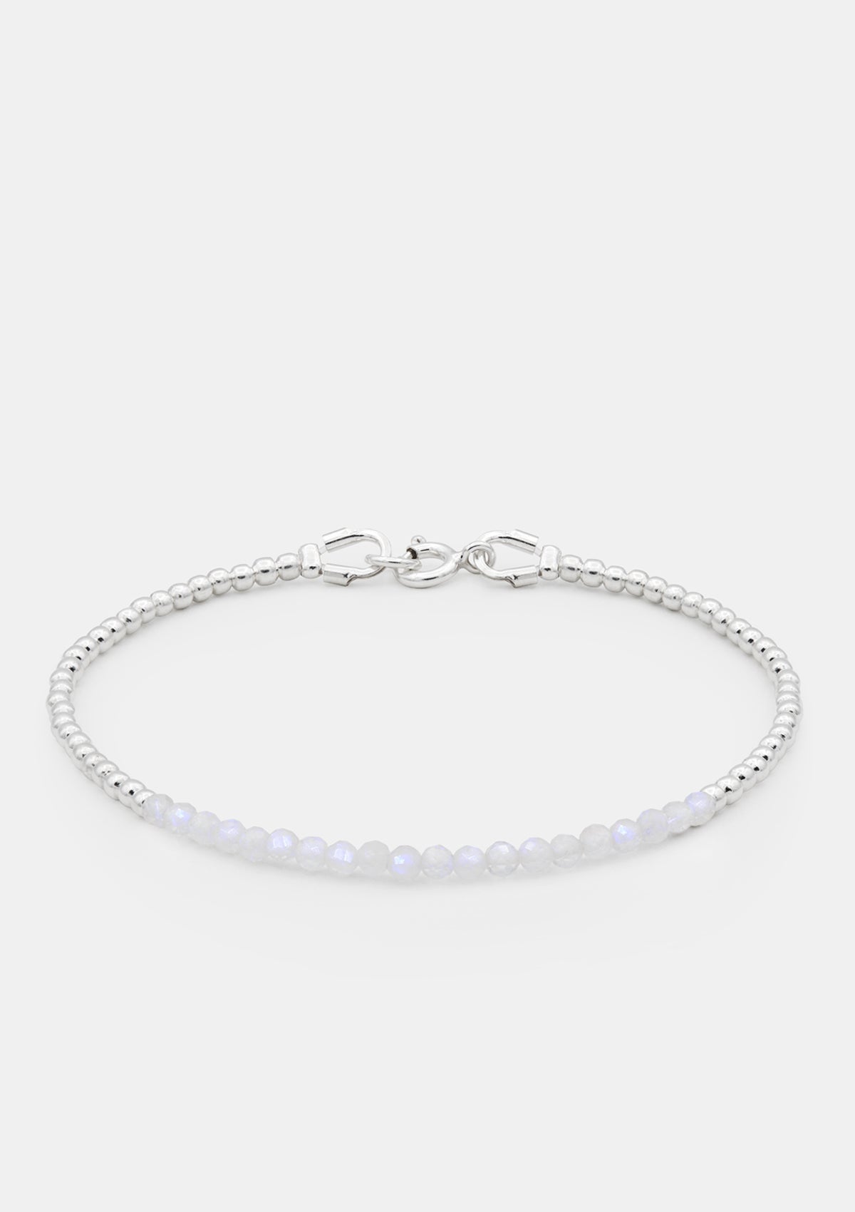 Moonstone and silver beaded bracelet on wrist, minimalist handmade jewelry, delicate stacking bracelet, natural gemstone accessory