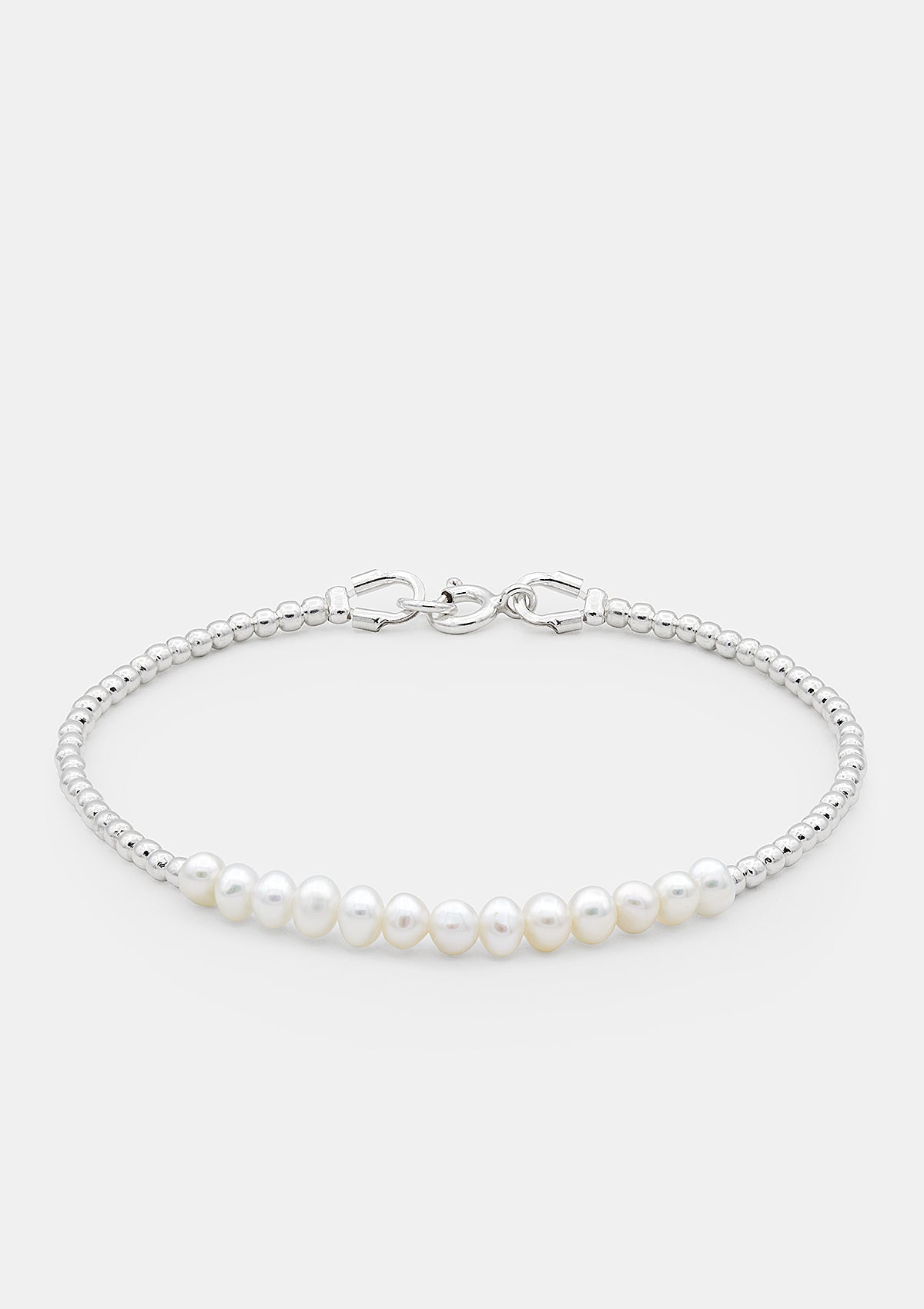Minimalist pearl bracelet with sterling silver chain, freshwater pearls, handmade delicate jewelry, modern silver bracelet on white background