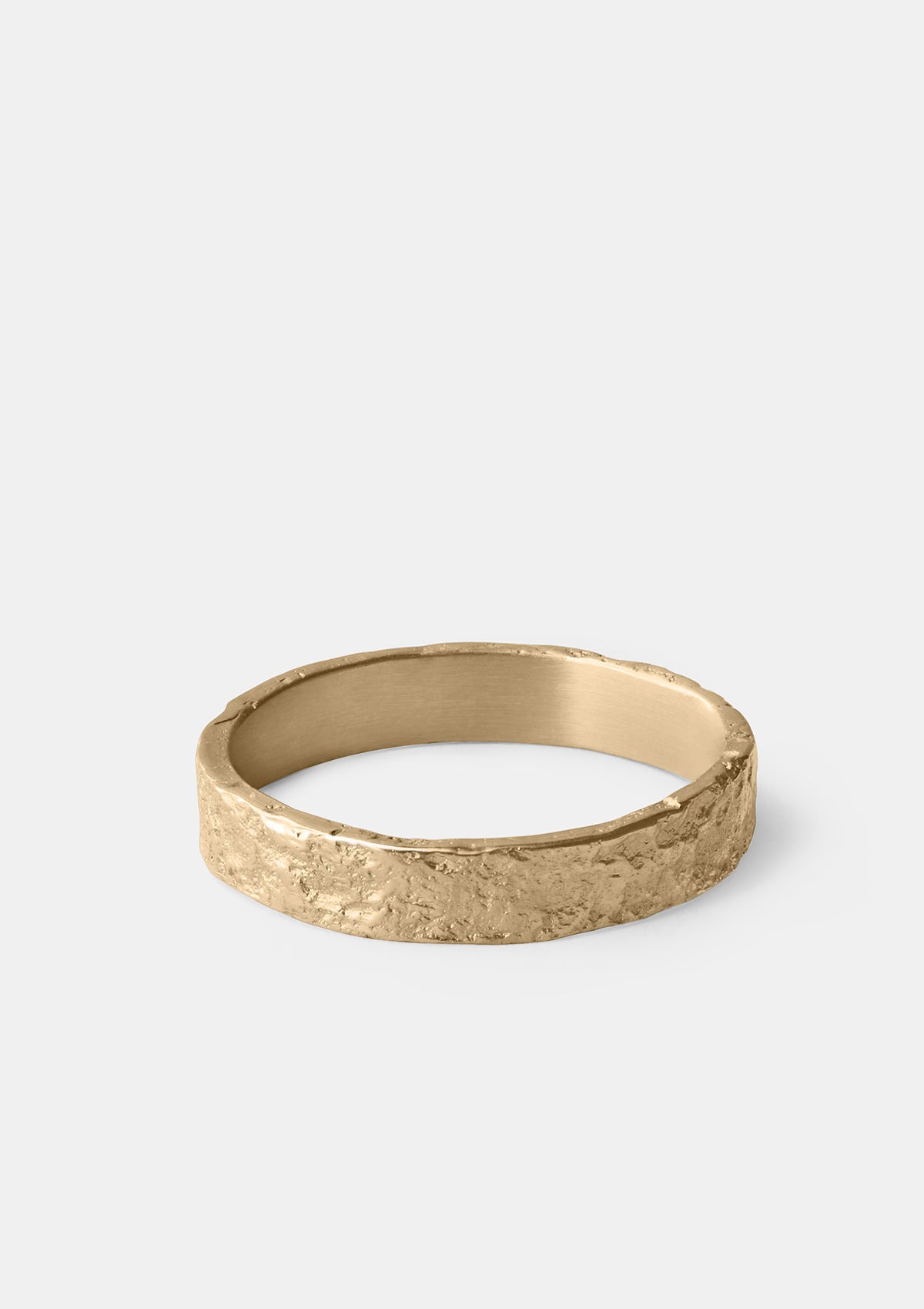 Bold wedding ring in 8K gold with organic sculpted surface, artisan men’s band with matte finish handmade in Germany