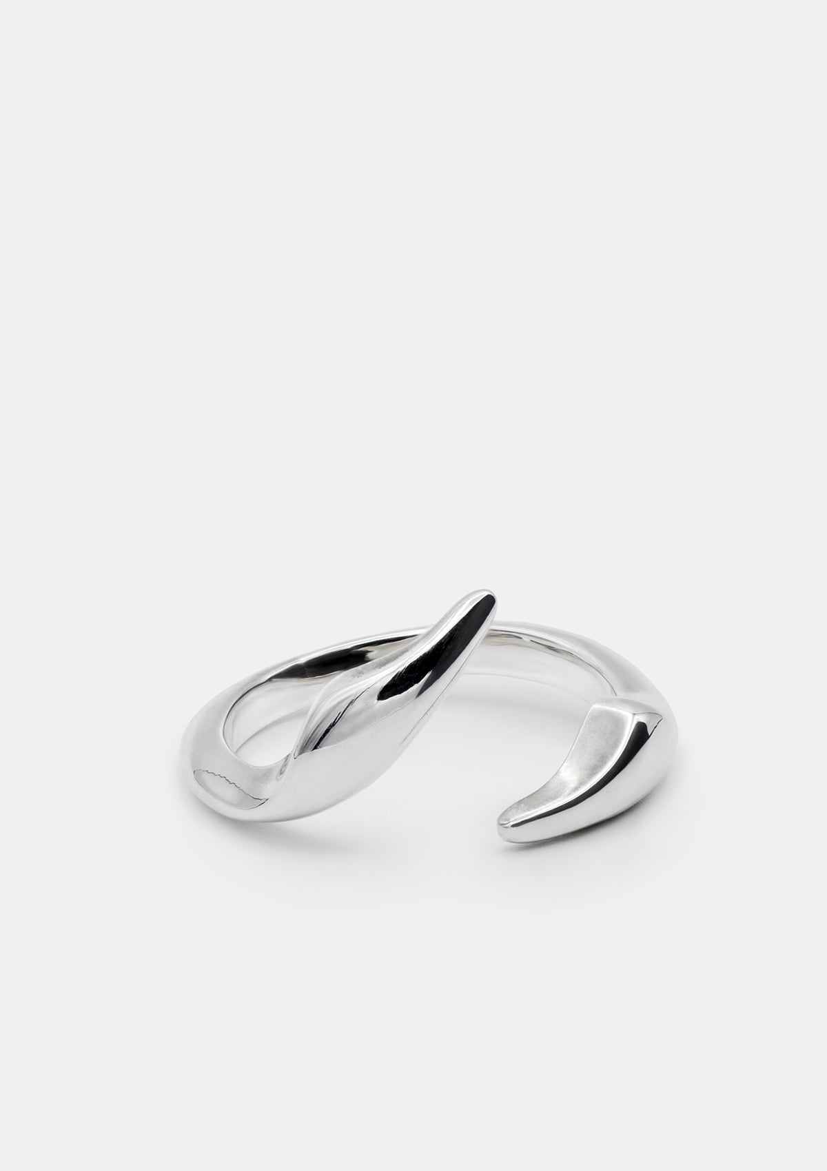 Minimalist adjustable silver ring with asymmetric Art Nouveau-inspired design, product view