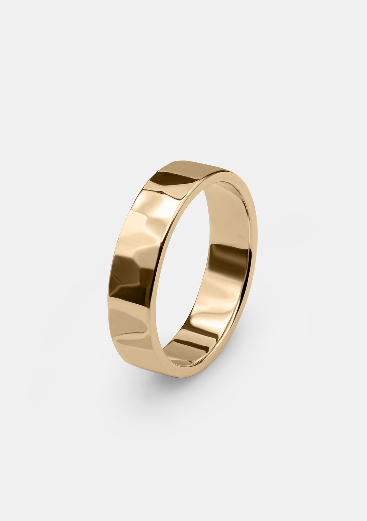 Solid yellow gold men's ring with soft-edged hammered facets, minimalist design