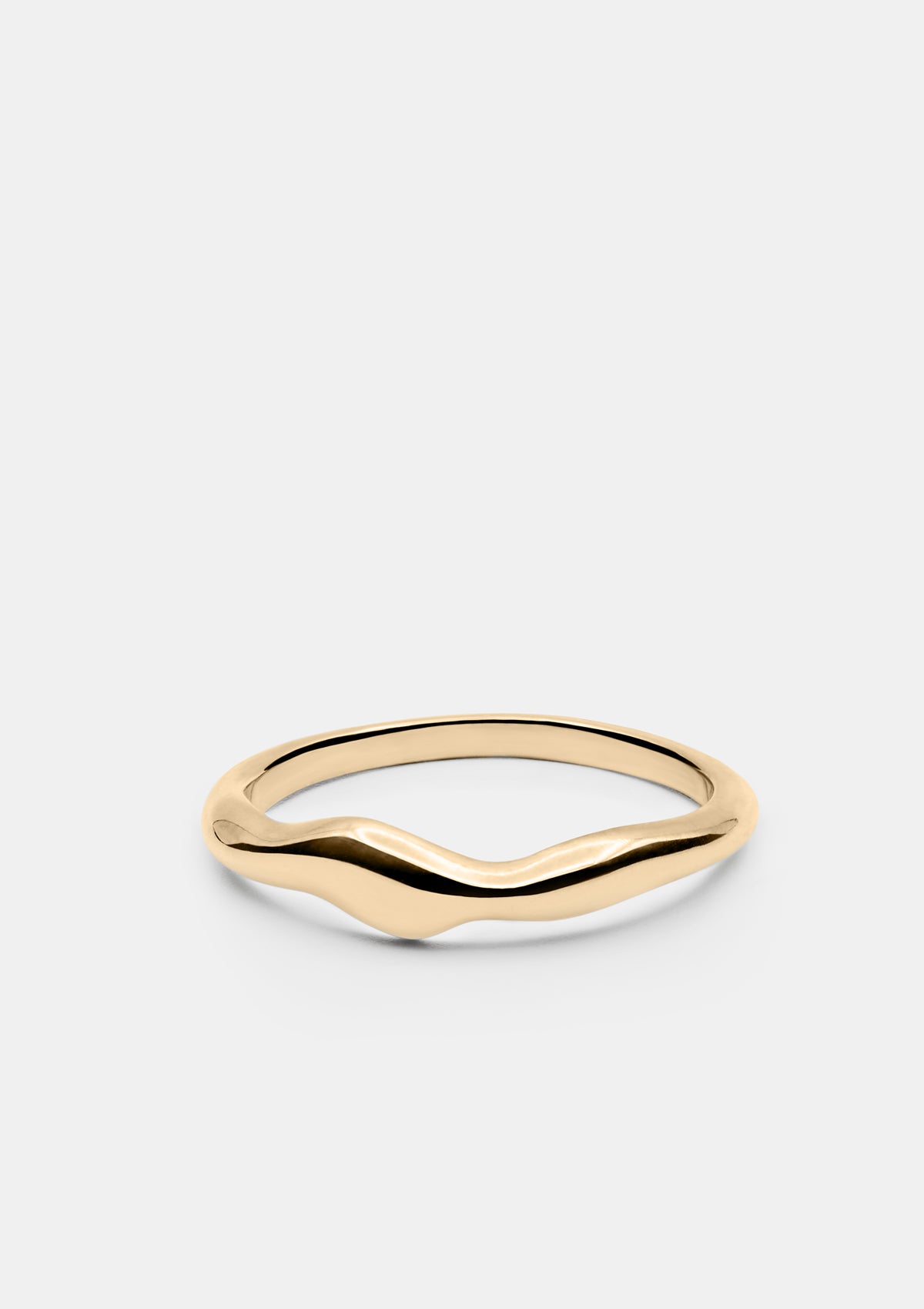 14k yellow gold ring with wave-like form on white background