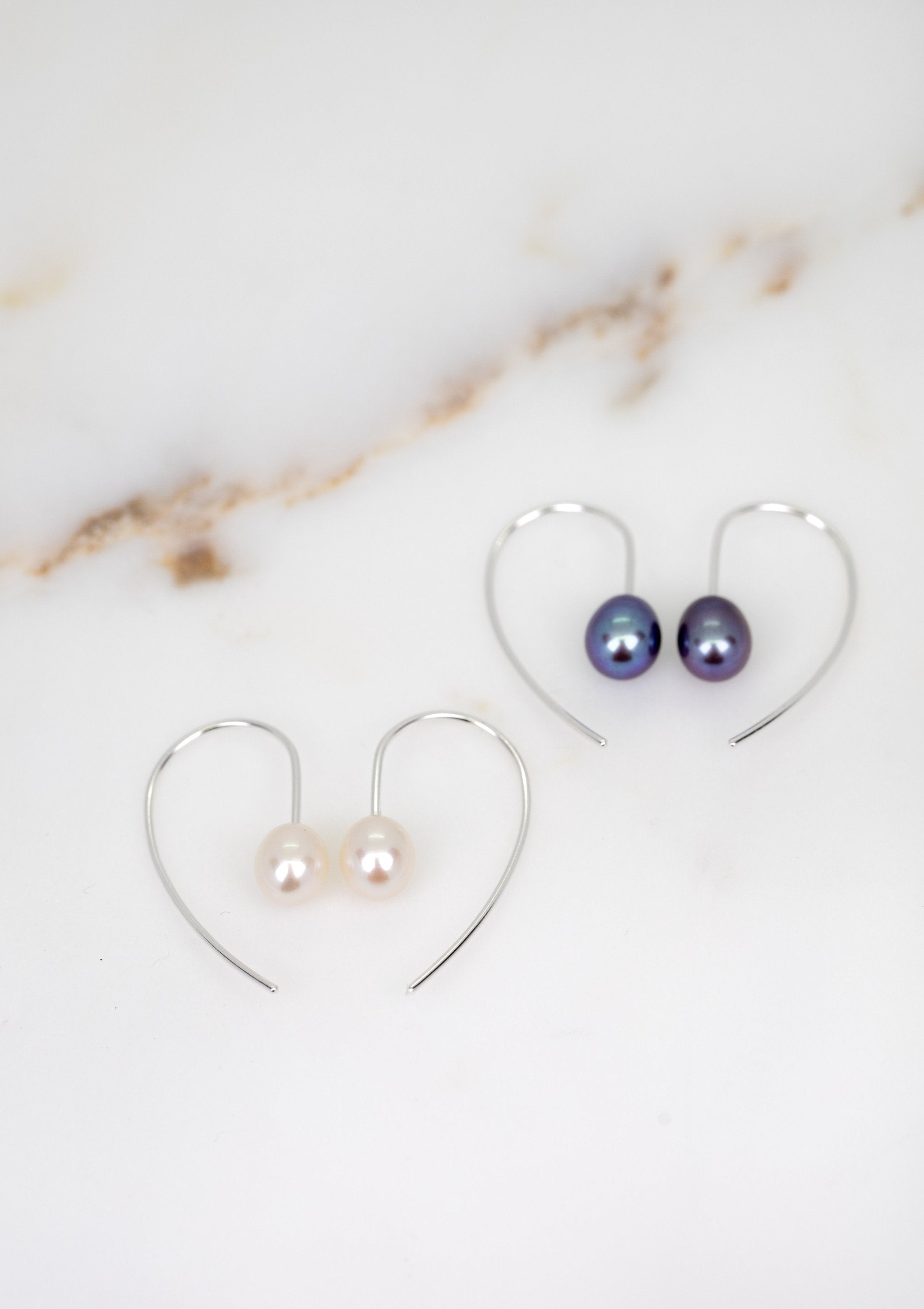 White pearl hooks by Sofia Kov – view 3