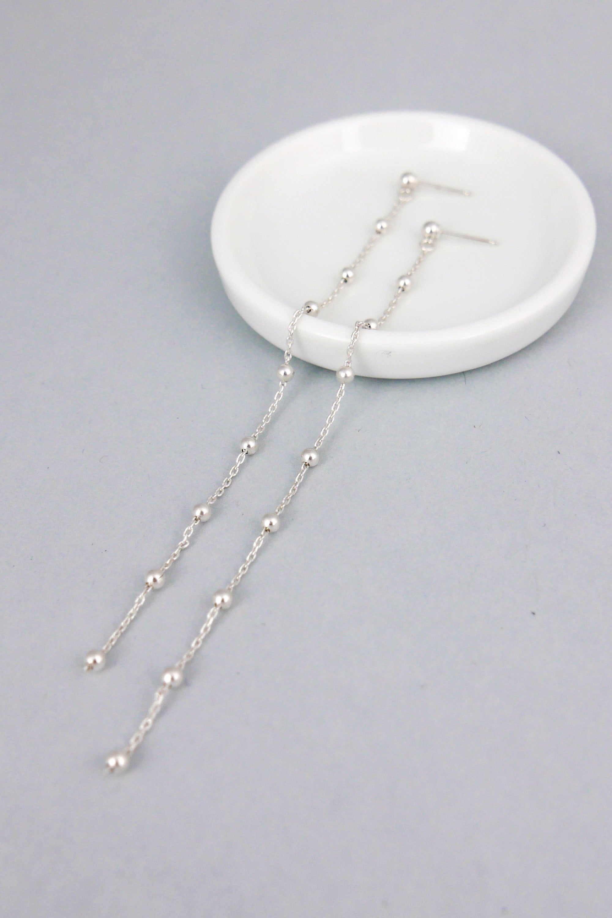 Beaded extra long earrings