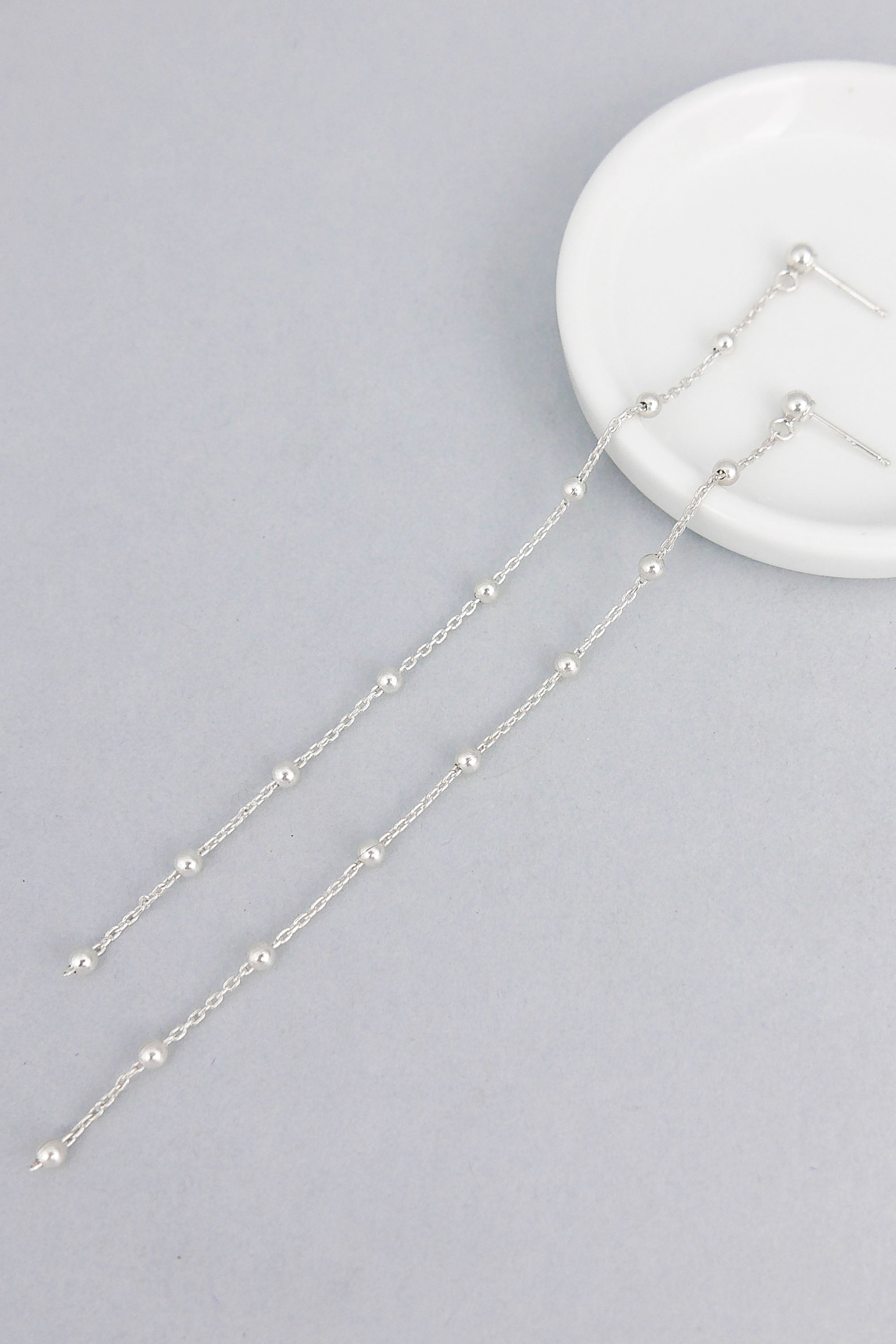 Beaded extra long earrings
