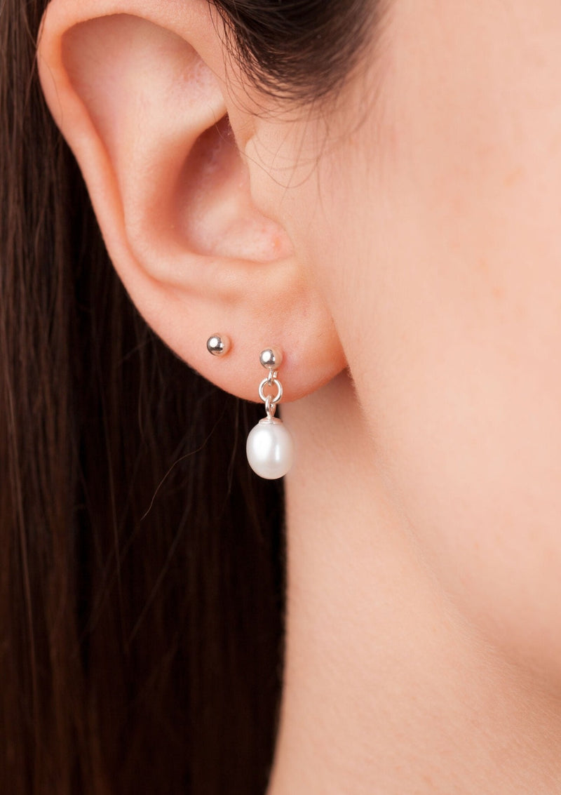 White pearl stud earrings